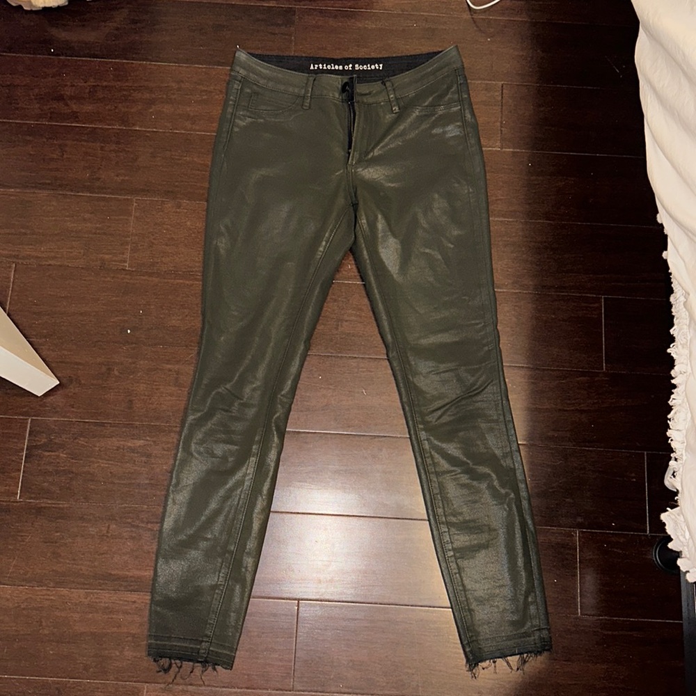 Dark green leather coated skinny jeans
